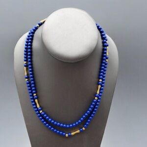 UNBRANDED VINTAGE BLUE GOLDTONE NECKLACE ELONGATED ROUND BEADS BARREL CLOSURE